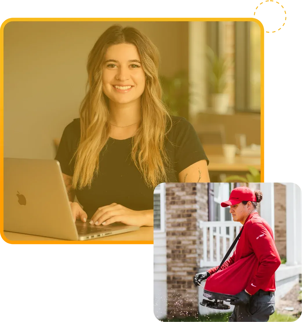 Katie M working at laptop in office