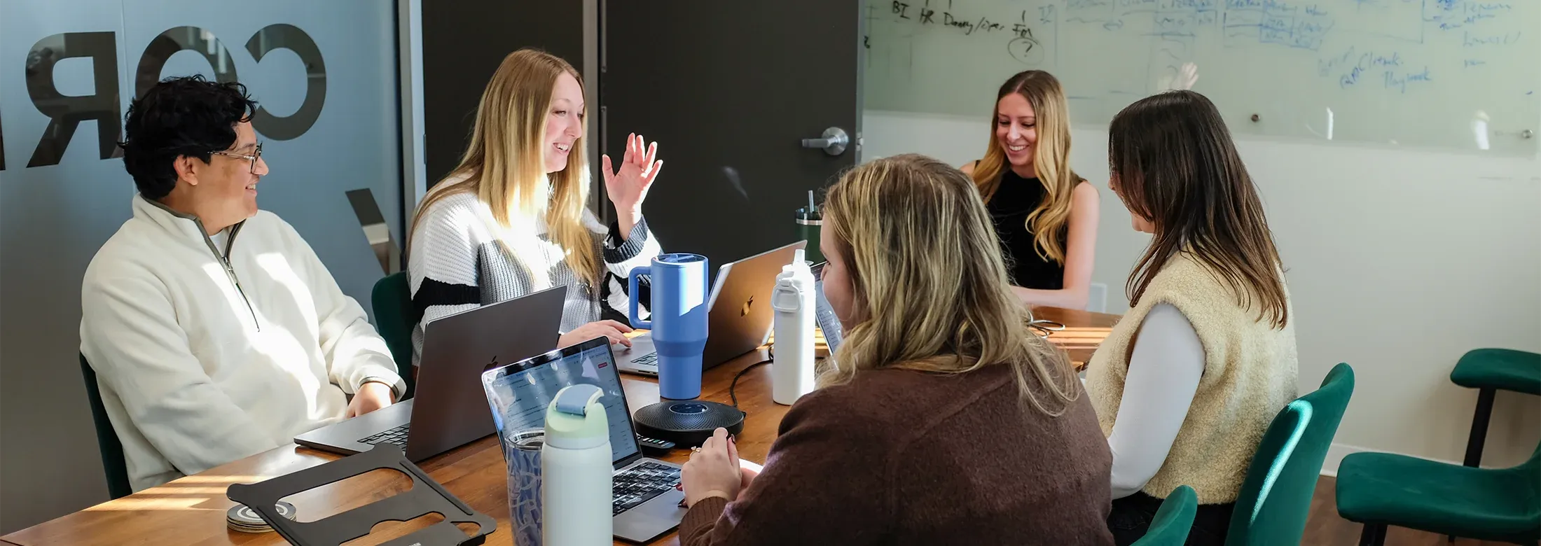 team meeting and discussing client projects