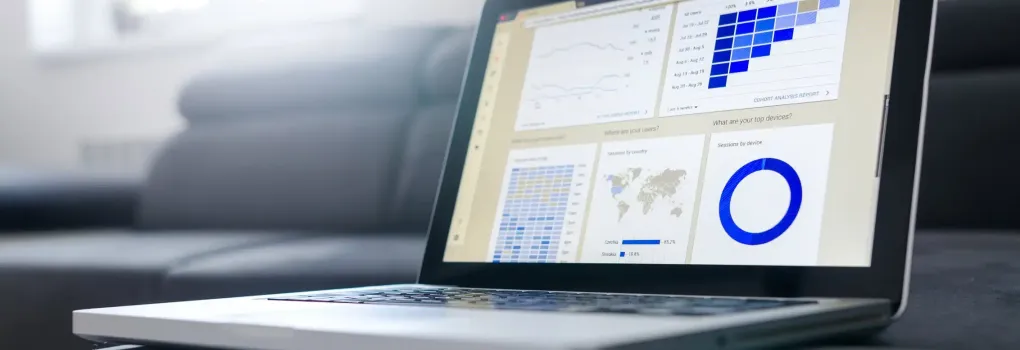 laptop with infographics on the screen