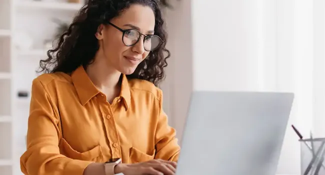 woman on laptop at desk
