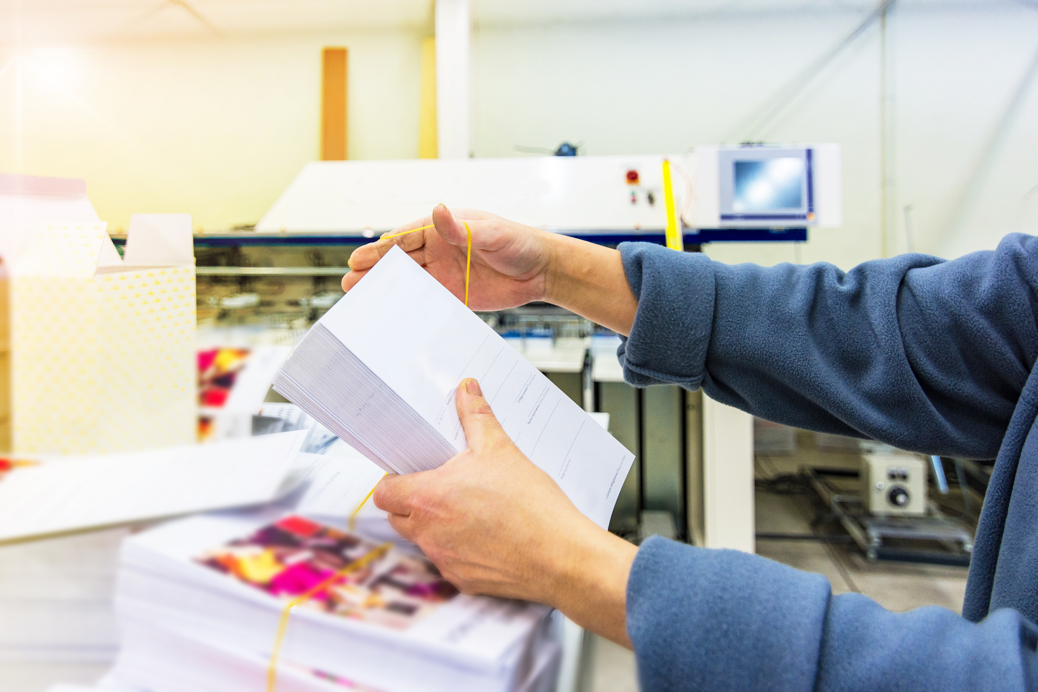 holding printed paper